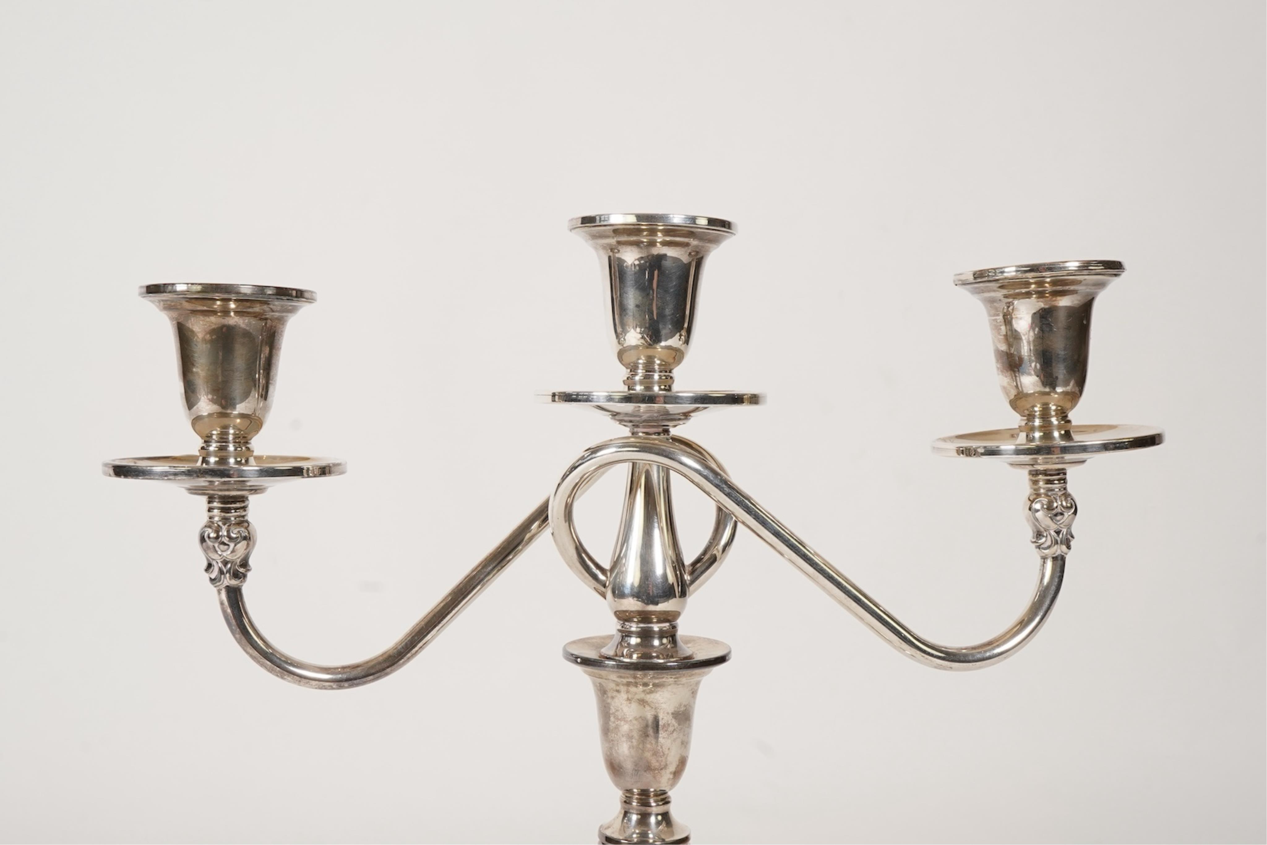 A 20th century U.S.A. International Sterling Royal Danish two branch, three light candelabrum